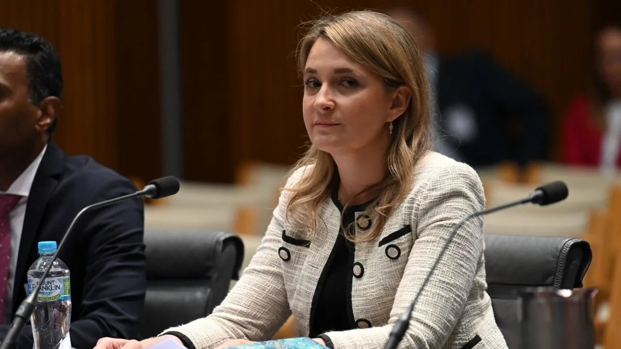 Police and security guarding Optus CEO clash with media after Senate grilling Police and security guarding Optus CEO clash with media after Senate grilling